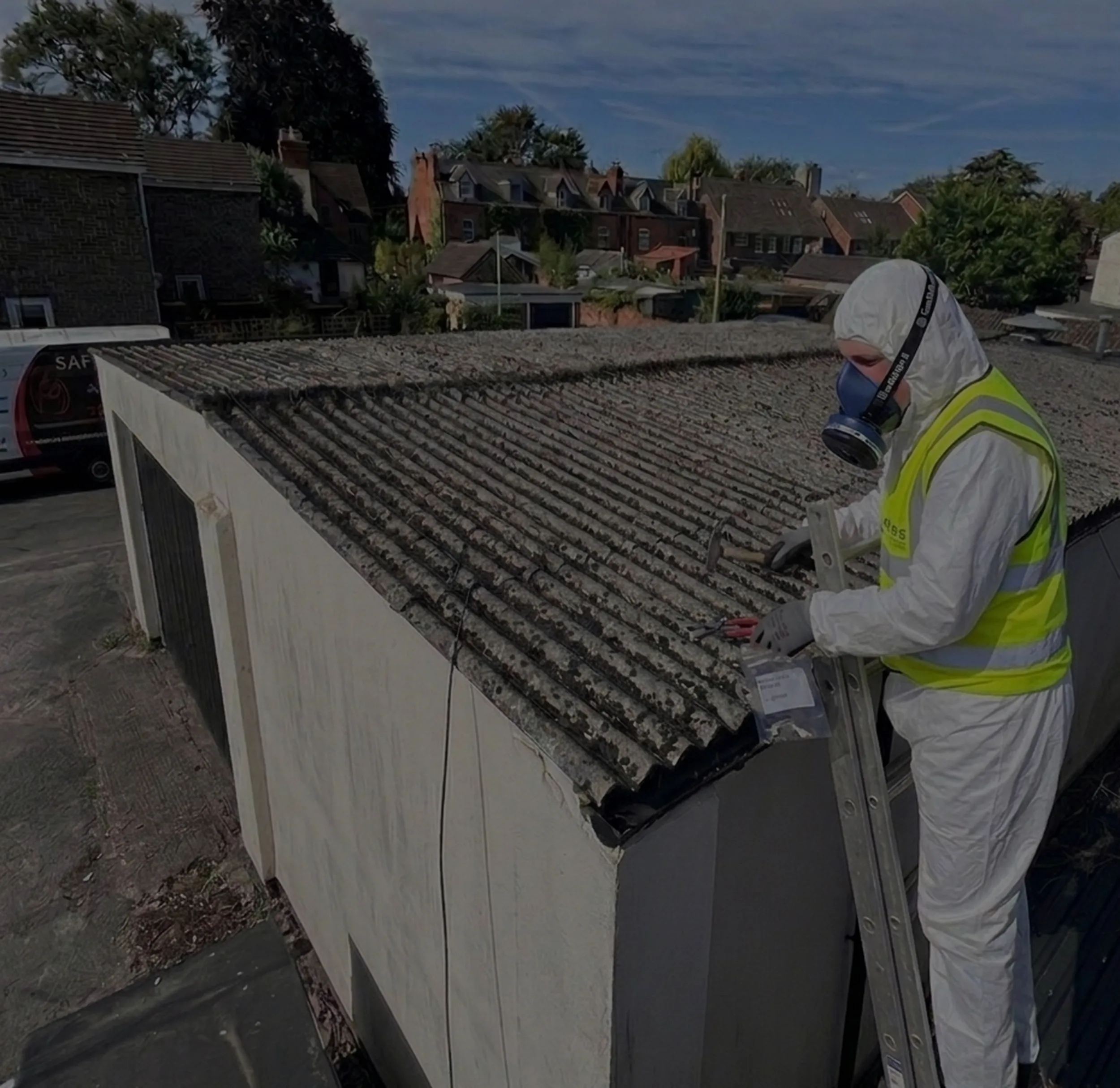 SafeZone tester taking a sample from an asbestos cement garage roof