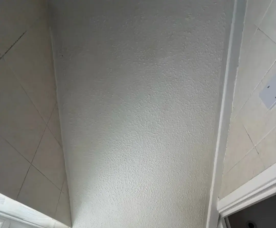 Room with textured ceiling before asbestos removal by SafeZone Asbestos Solutions