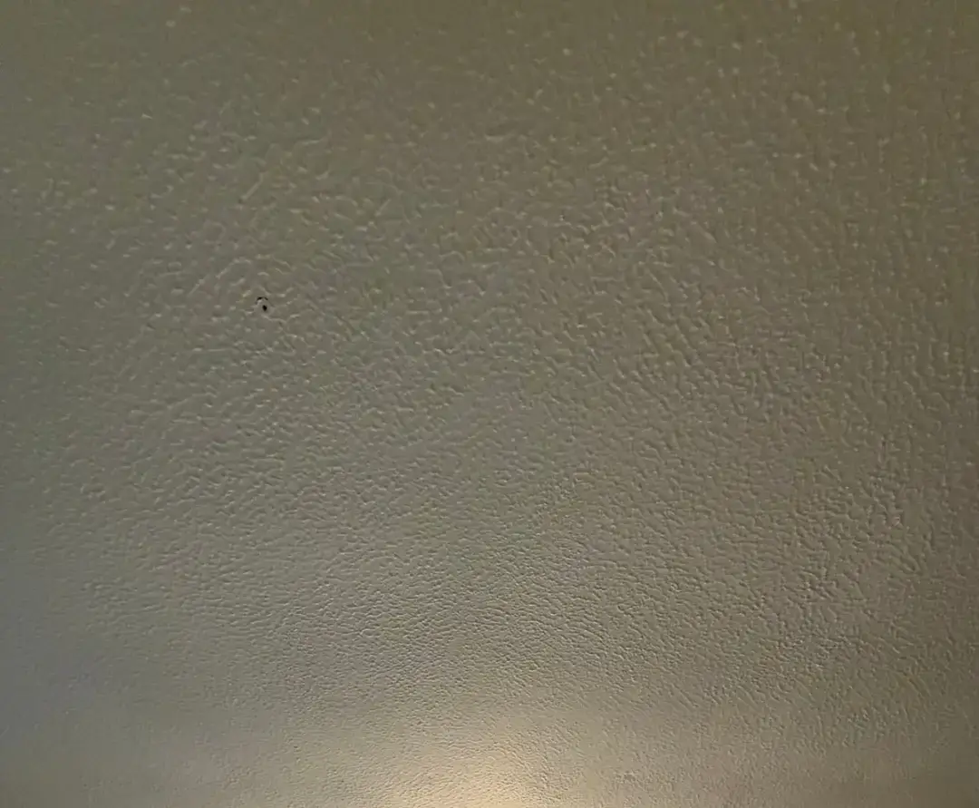 Textured Artex ceiling before asbestos removal by SafeZone Asbestos Solutions